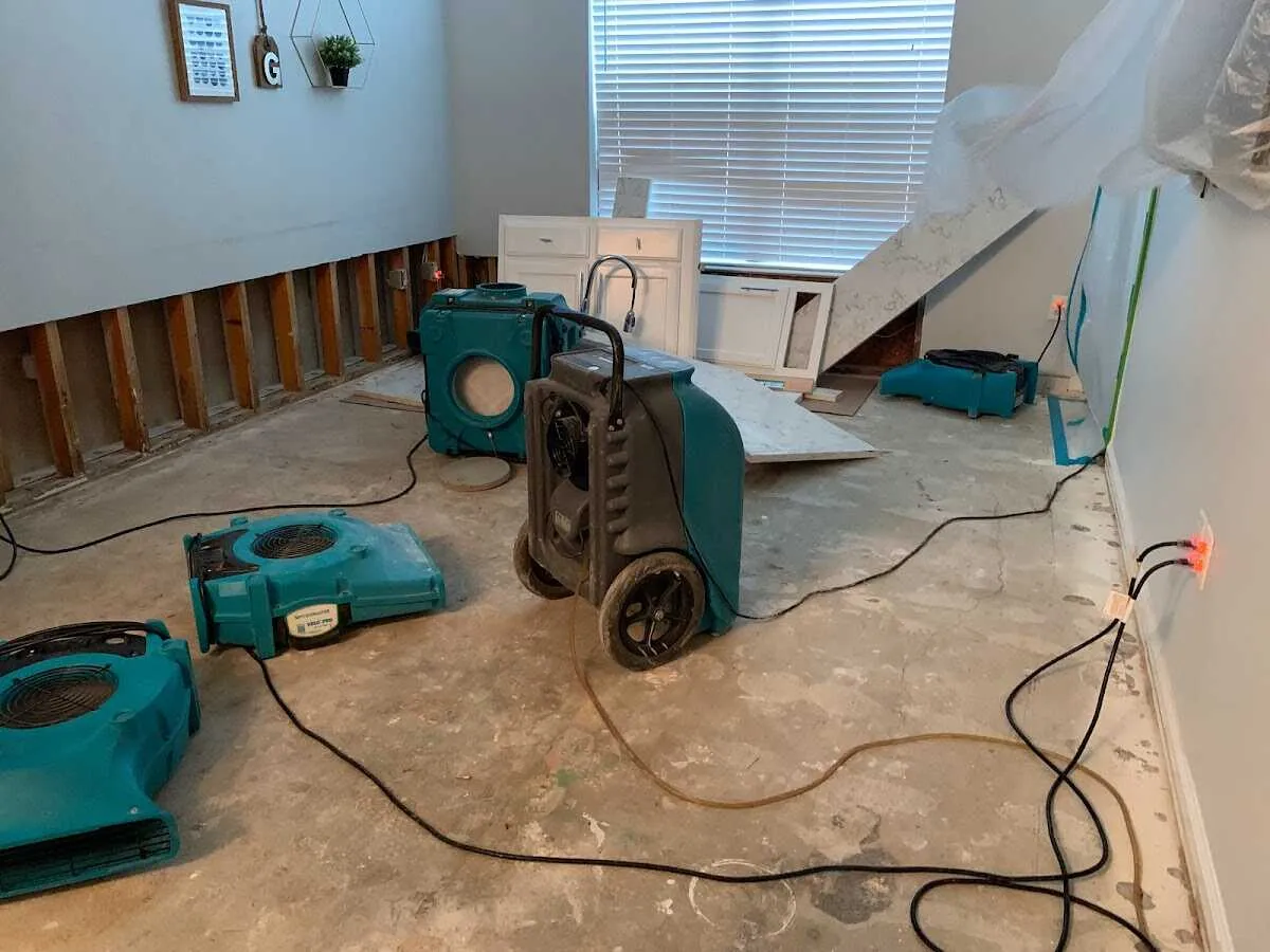Dehumidifier in flood-cut room for Water Damage Restoration in Vernon